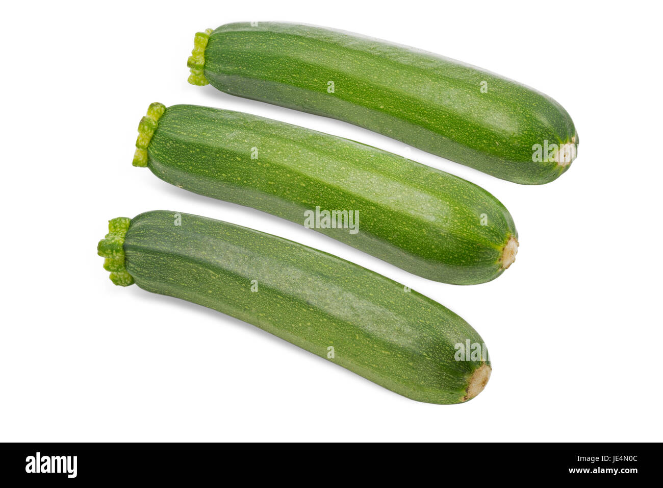 Drei reife Zucchinis auf weißem Hintergrund Stock Photo