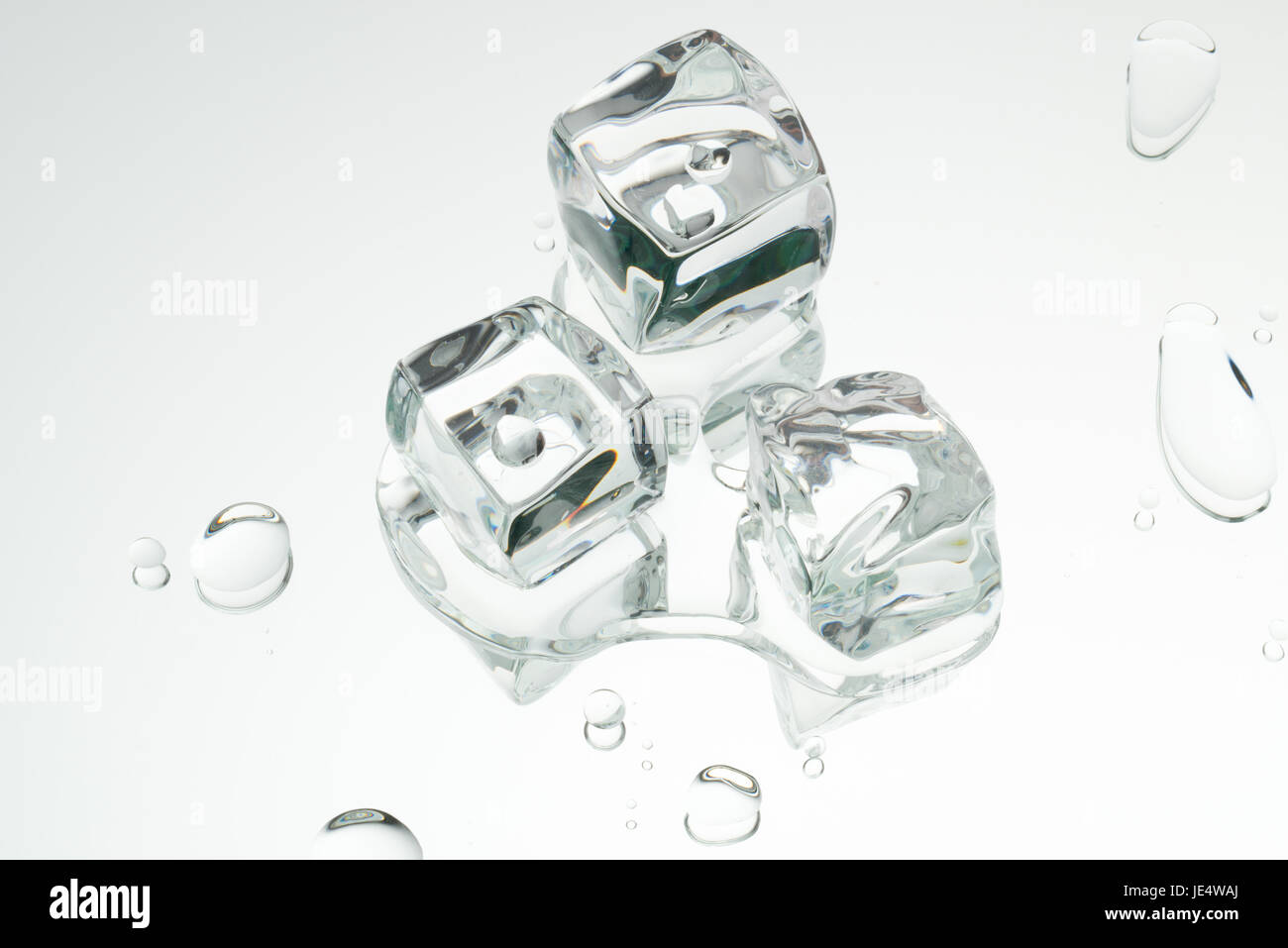 Acrylic ice cubes and drops of water. Stock Photo
