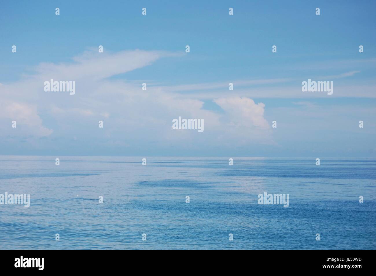 Calm Blue Ocean View meets the Sky Stock Photo - Alamy