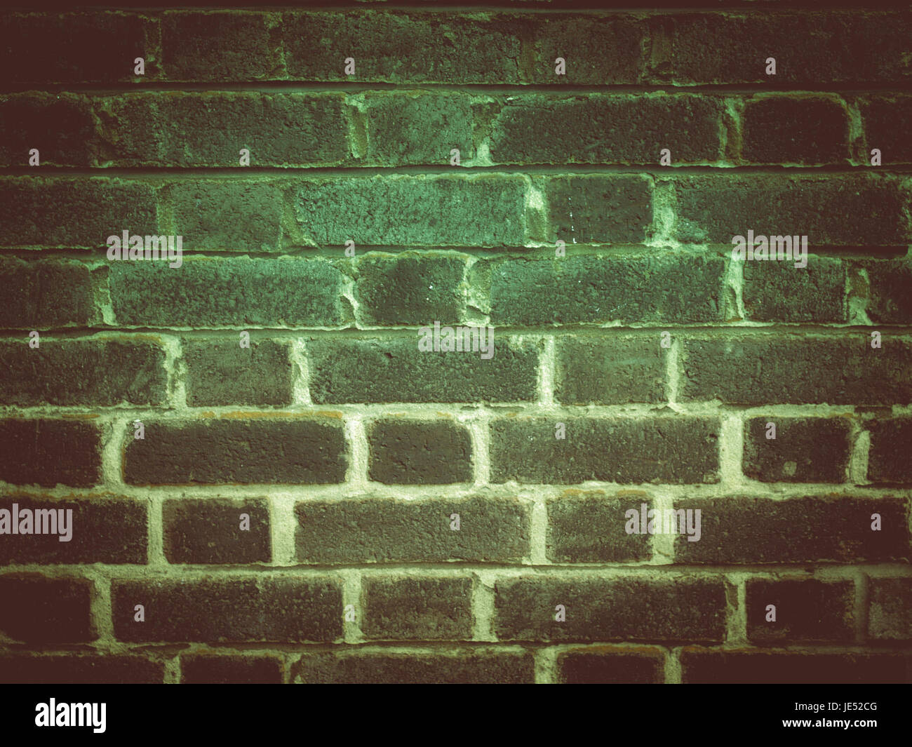 Vintage looking Red brick wall useful as a background Stock Photo - Alamy