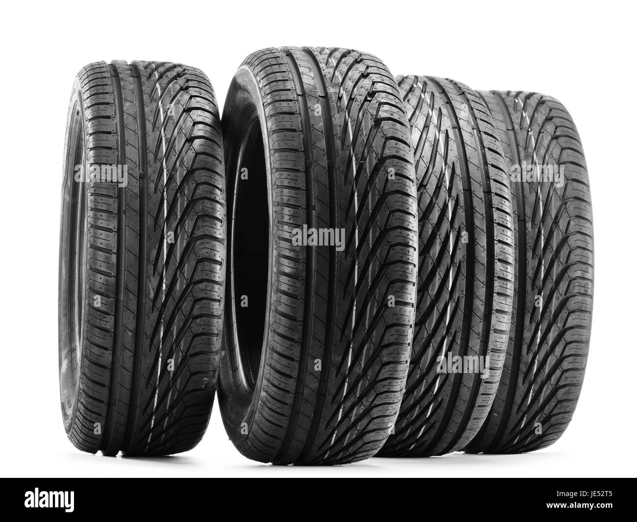 Four new black tires isolated on white background Stock Photo Alamy