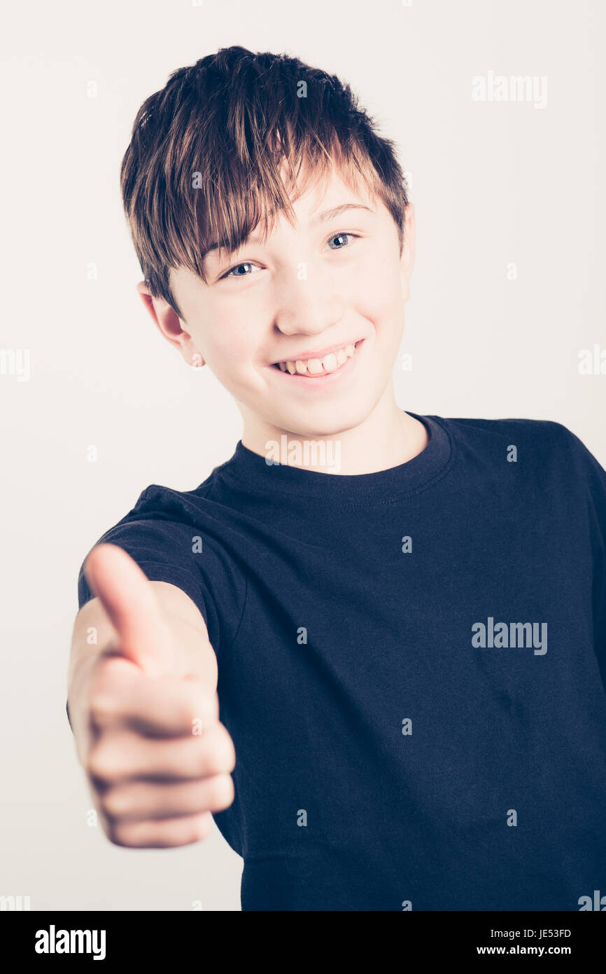 little smiling boy thumbs up - filtered retro style Stock Photo - Alamy