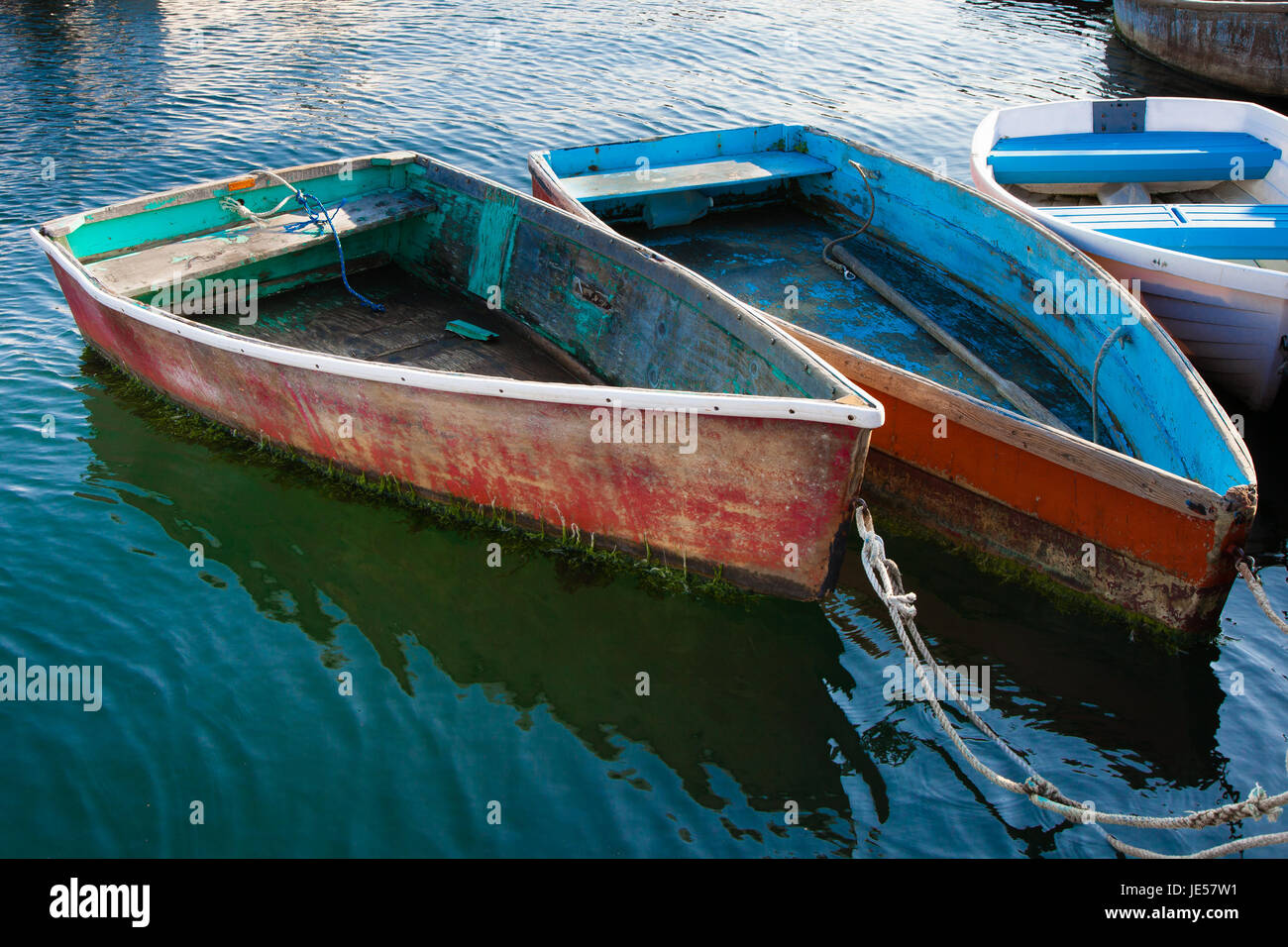 Old wooden row boats with peeling paint Stock Photo