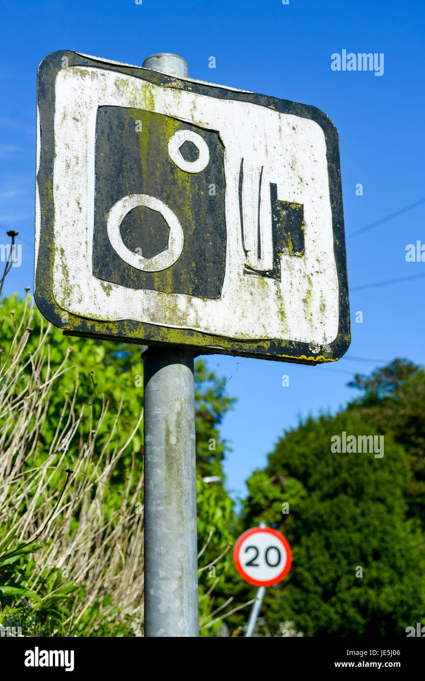 Speed camera sign showing showing evidence of wear and degradation. Stock Photo