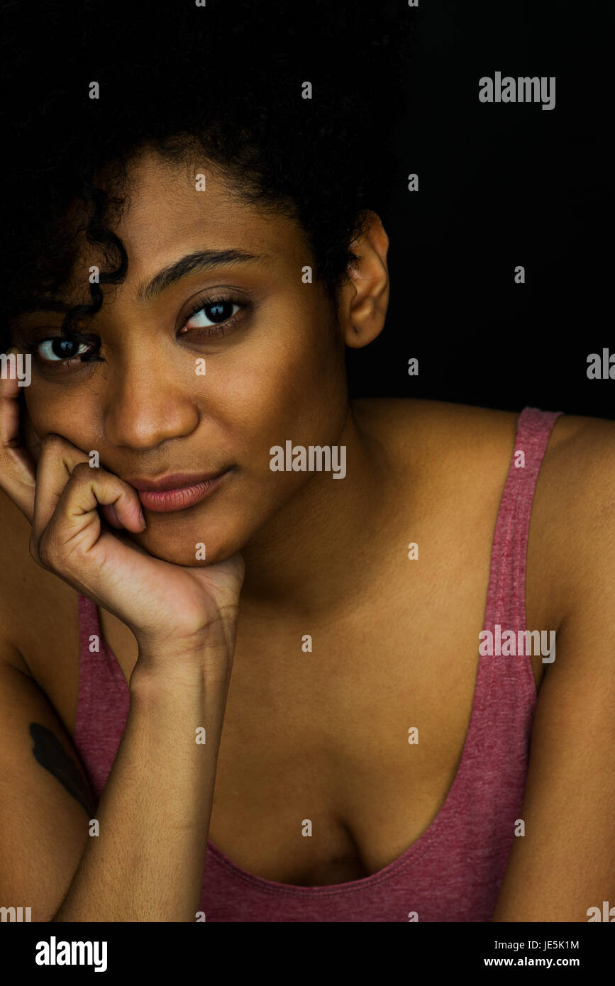 Resting chin on hand hi-res stock photography and images - Alamy