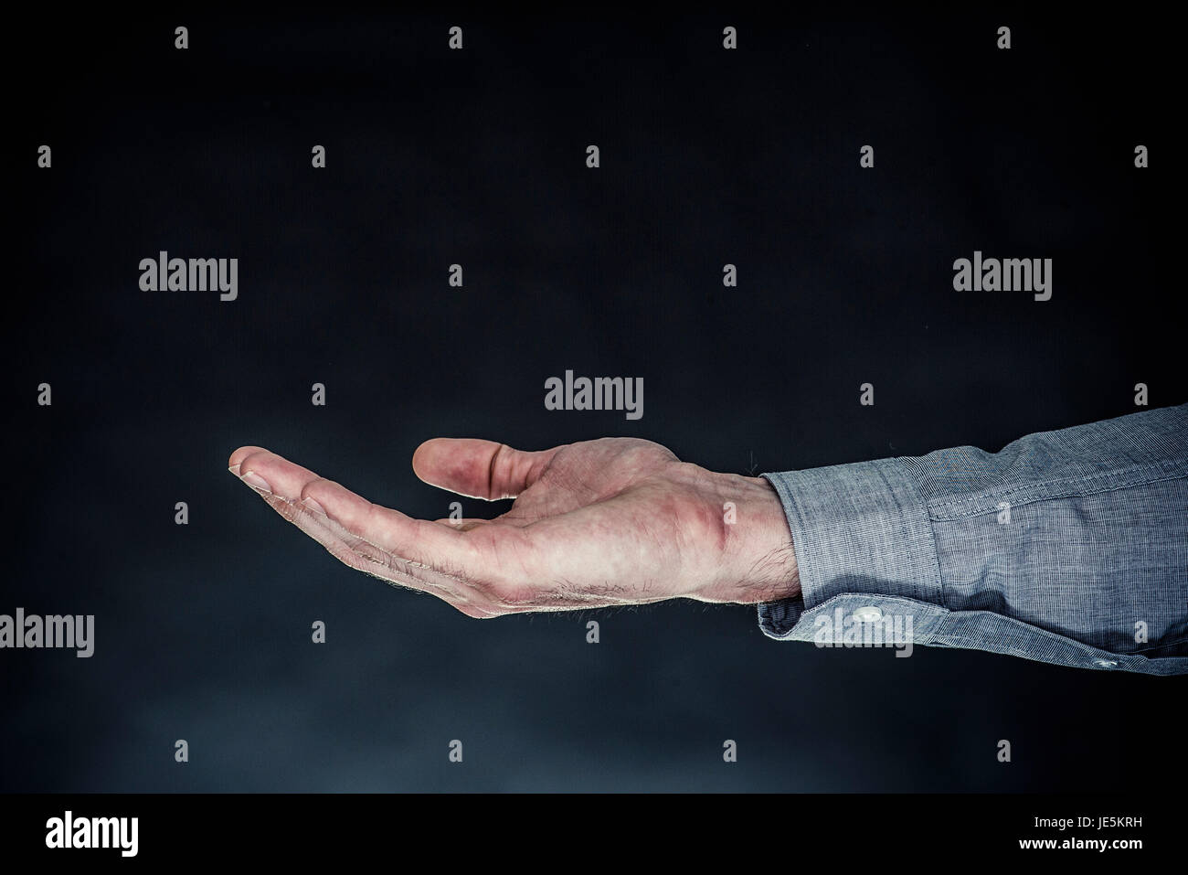 Man's extended hand, palm facing up Stock Photo Alamy