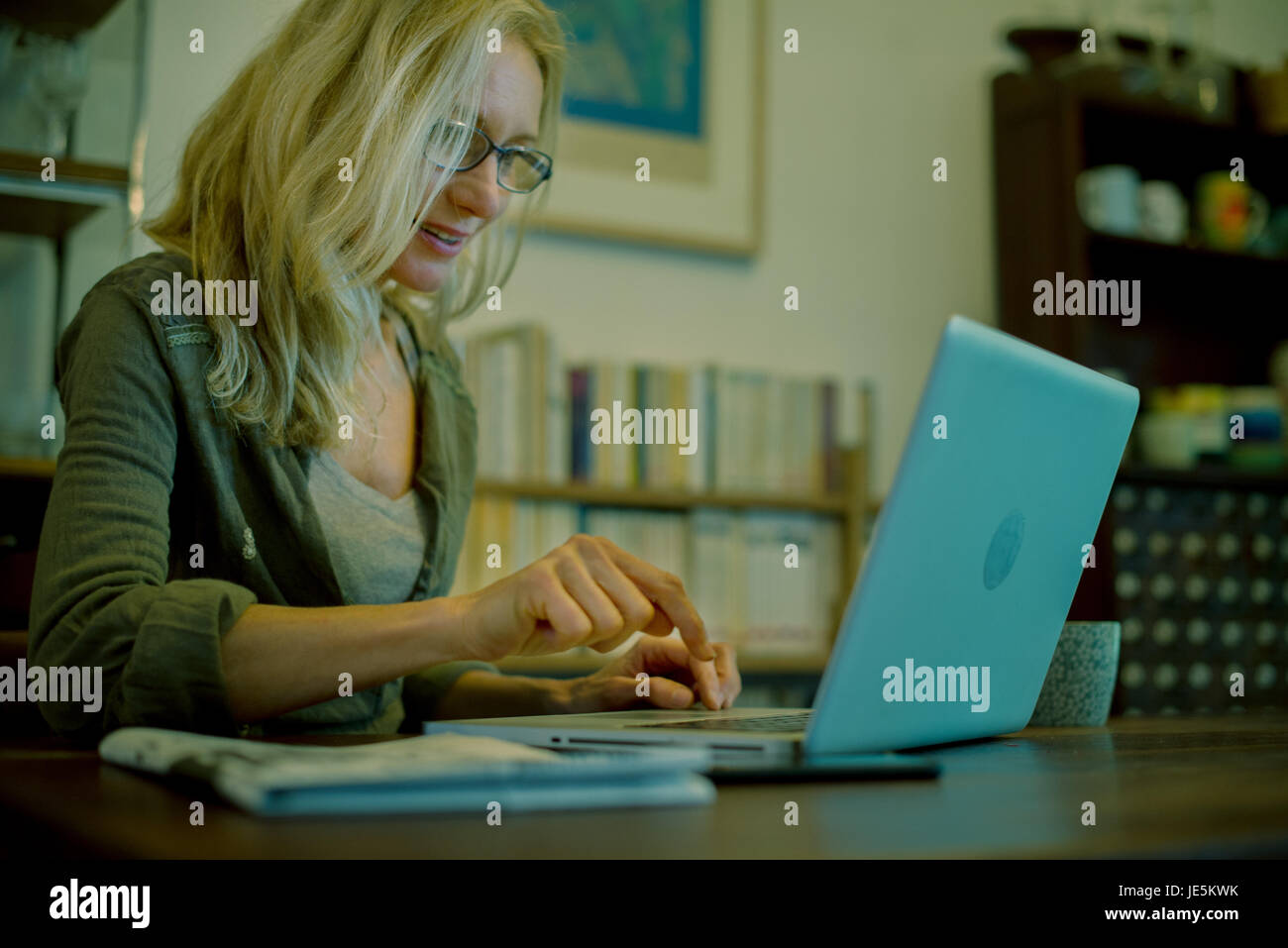 Woman using laptop computer Stock Photo