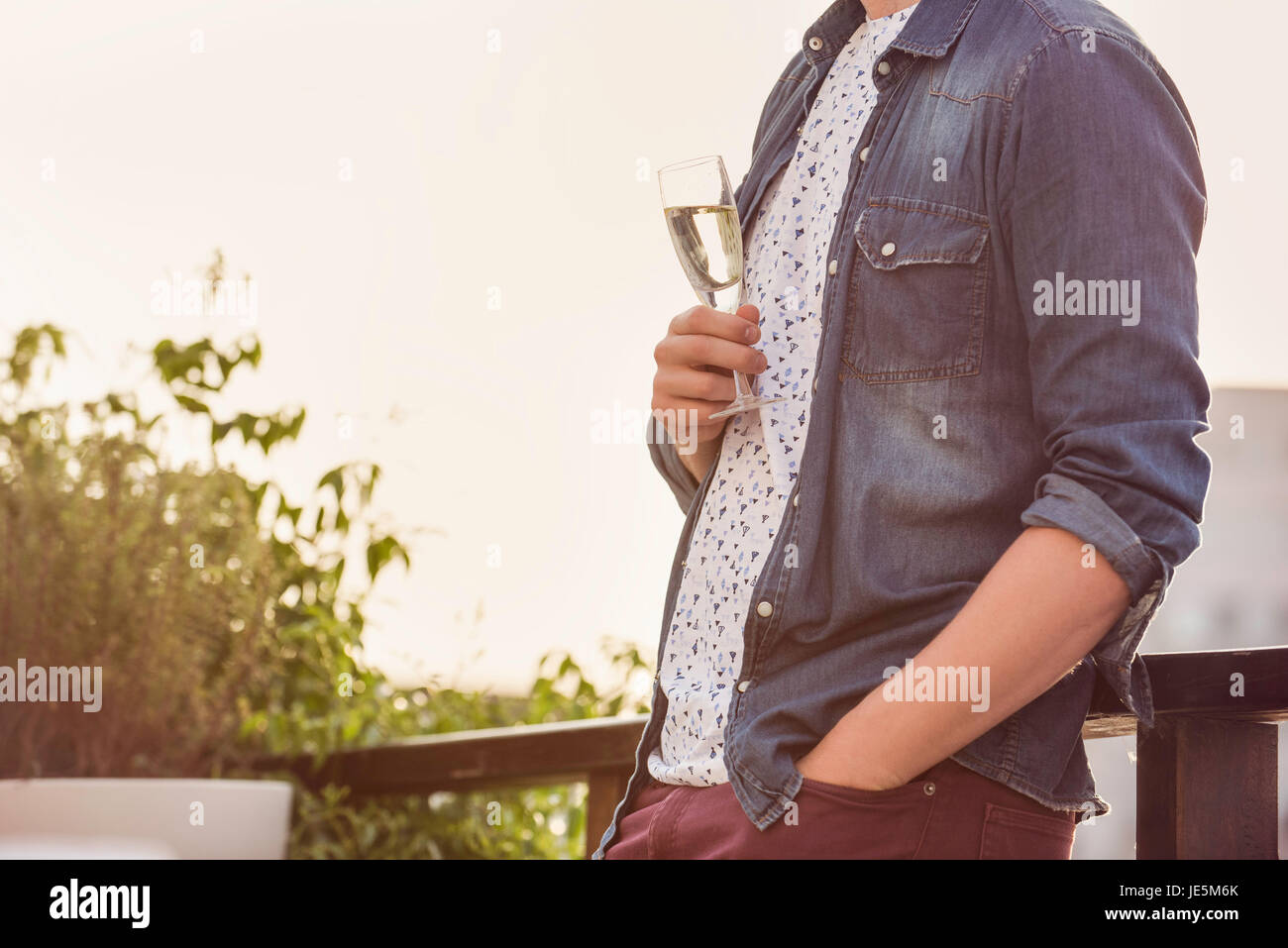 Man with glass of champagne Stock Photo