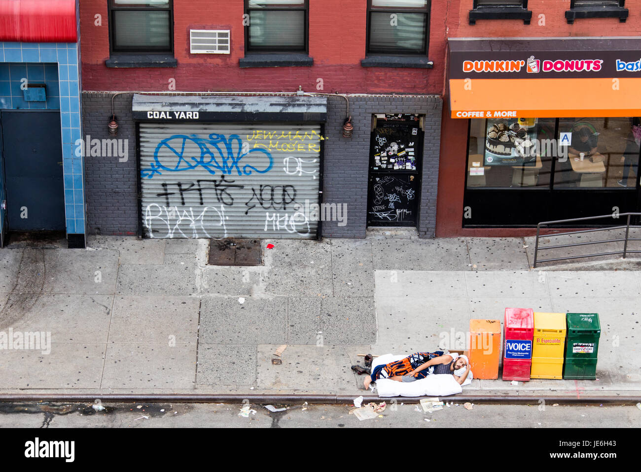 Homeless man sleeping in the East Village, Manhattan, New York City ...