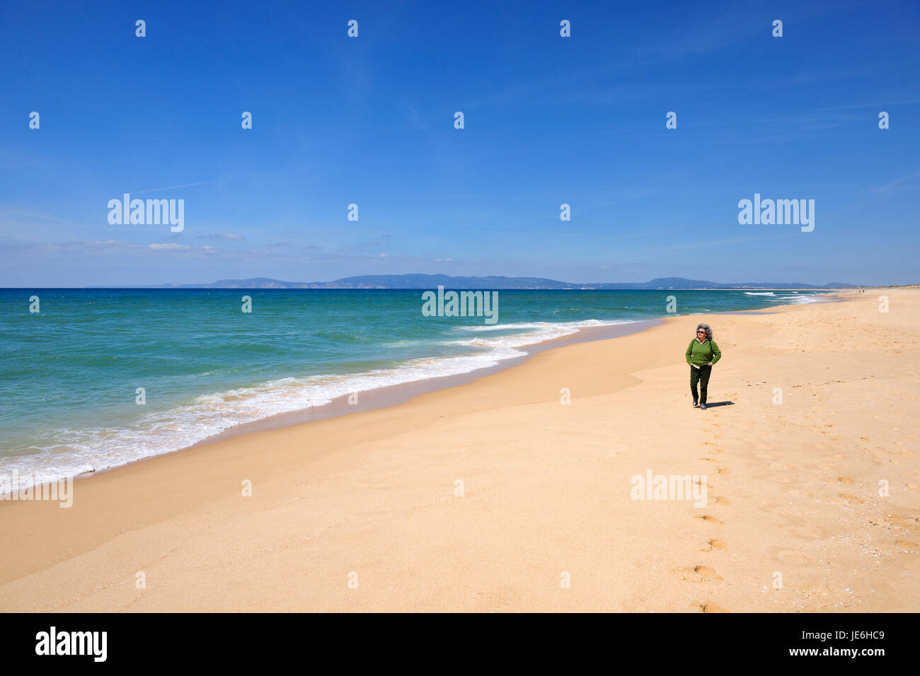 Walking by the Comporta beach in the Troia peninsula. Portugal Stock Photo