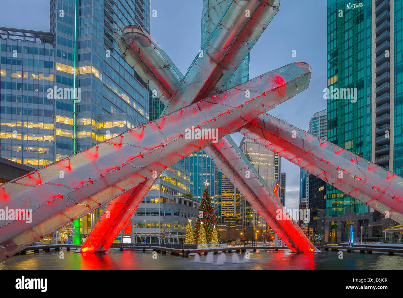 Christmas trees framed by the Olympic Cauldron, Jack Poole Plaza