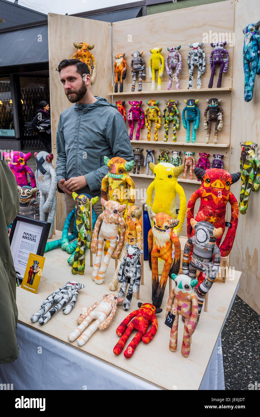 Limited edition Papercut Monsters, art dolls toys  by designer Joel Kadziolka.at Car Free Day, Main Street, Vancouver, British Columbia, Canada. Stock Photo