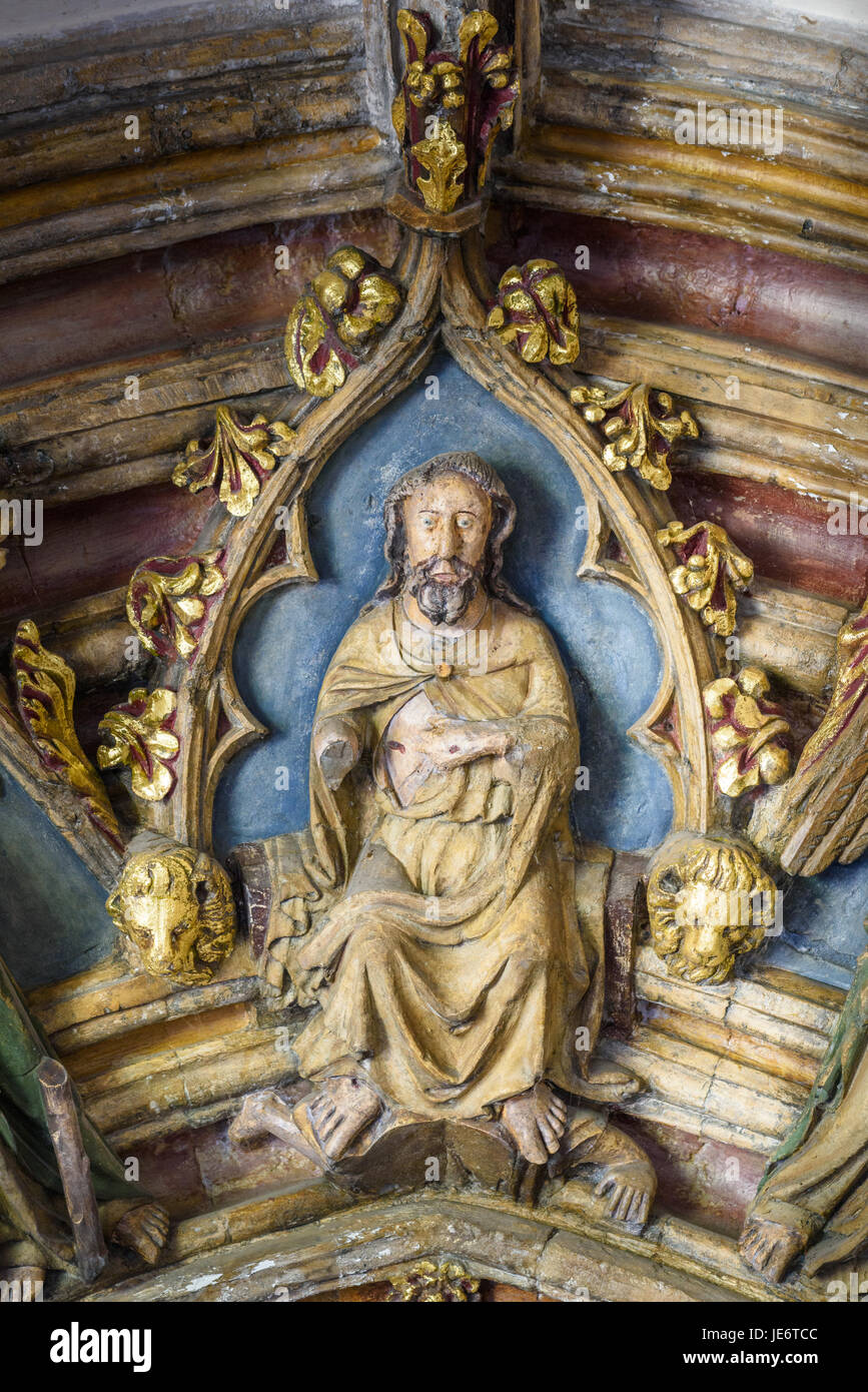 Boss on the ceiling of the cloisters at the christian cathedral church of the Trinity in Norwich, England, whose construction was begun by the normans Stock Photo