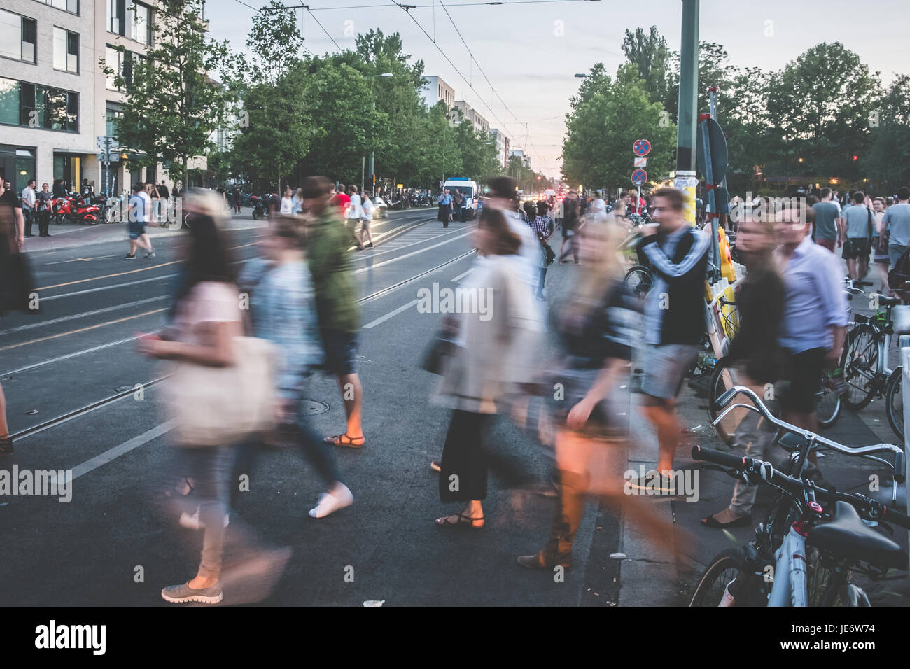 people crossing street - blur / city traffic Stock Photo