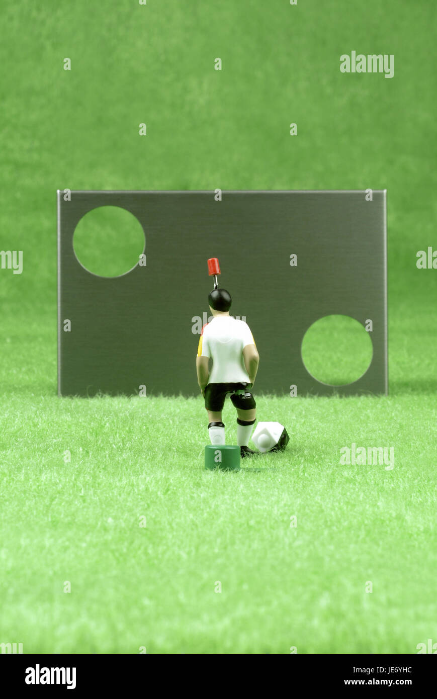 Goal wall with ball and player Stock Photo Alamy