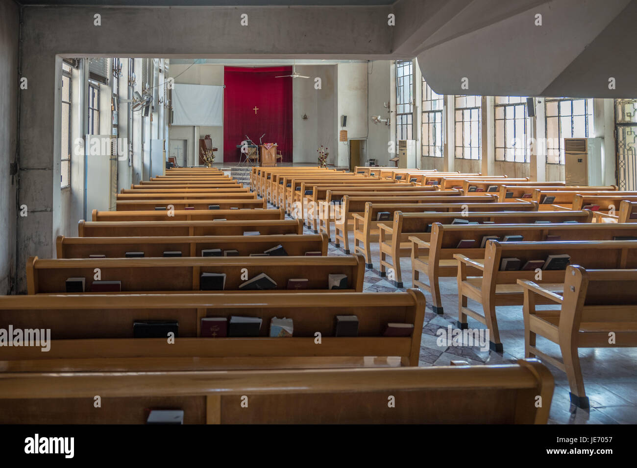 Kamishli Evangelical Church with portraits of Bashar Hafez al-Assad in Kamishli, Syria. Stock Photo