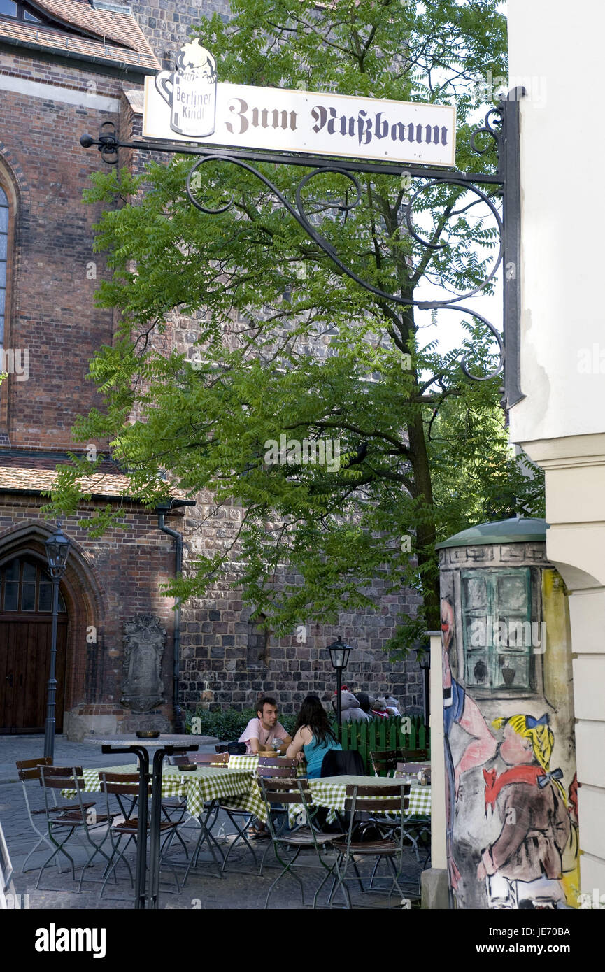 Germany, Berlin, Nikolaiviertel, Two people in a street cafe, Stock Photo