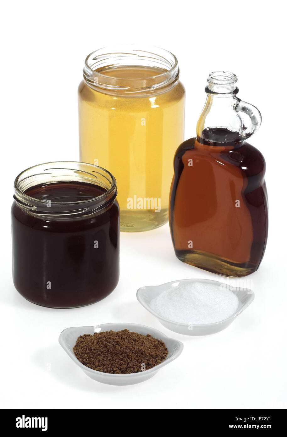 Crystal sugar, brown sugar, maple syrup, turnip syrup, honey, Stock Photo