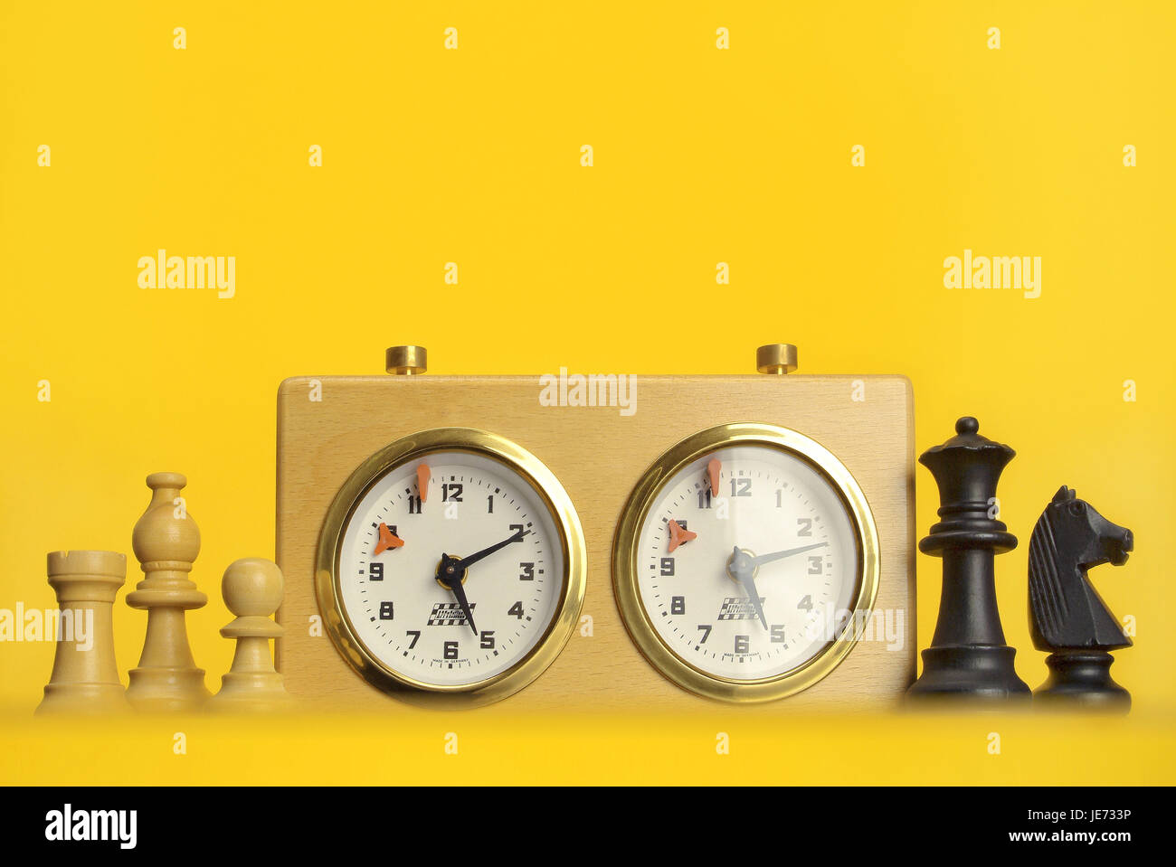 Chess clock, chess pieces Stock Photo Alamy