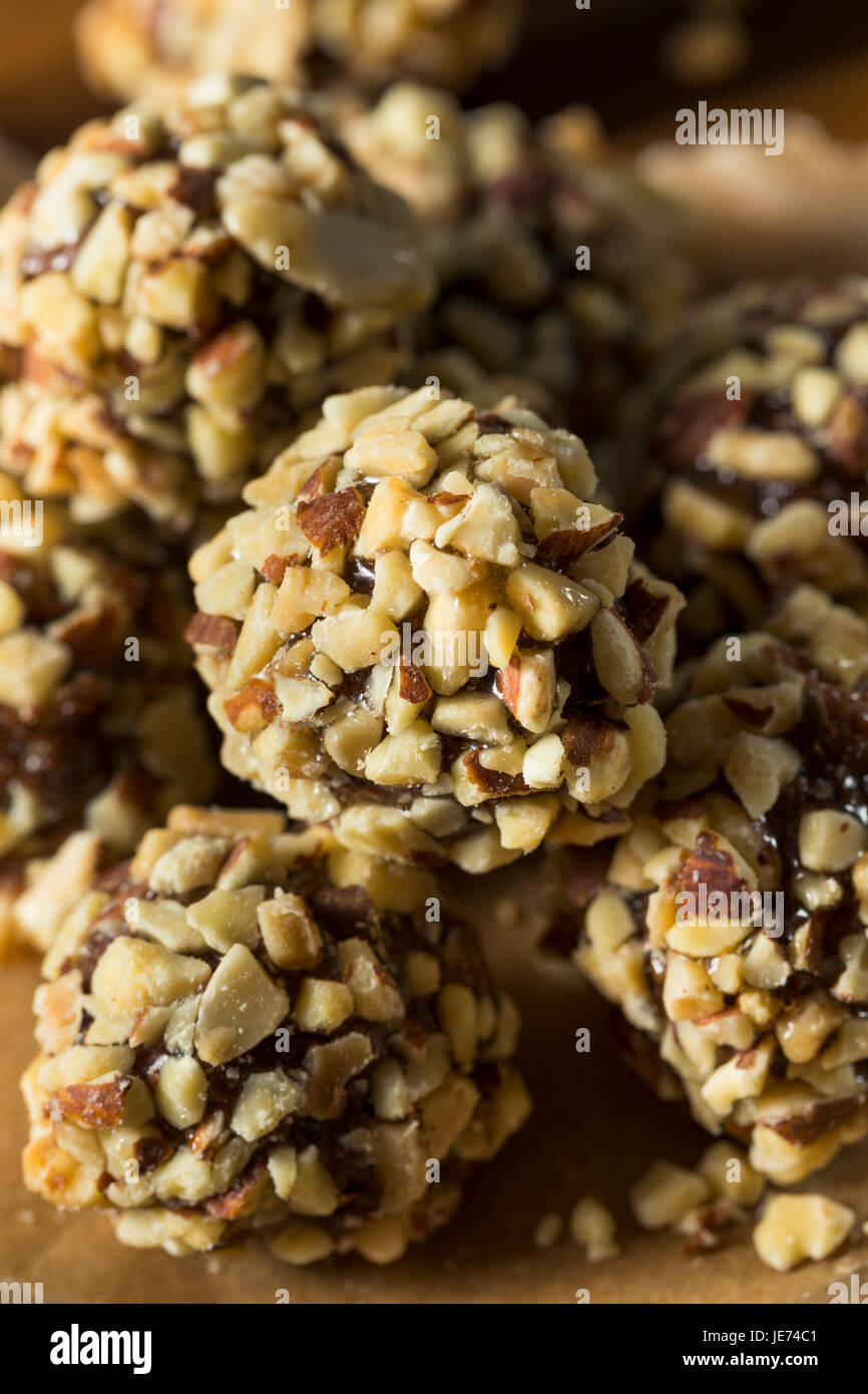 Raw Homemade Healthy Gluten Free Date Bites with Cherry and Chocolate Stock Photo