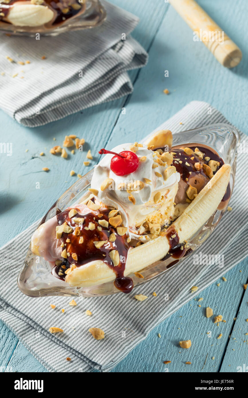 Sweet Homemade Banana Split Sundae with Chocolate Vanilla  Strawberry Ice Cream Stock Photo