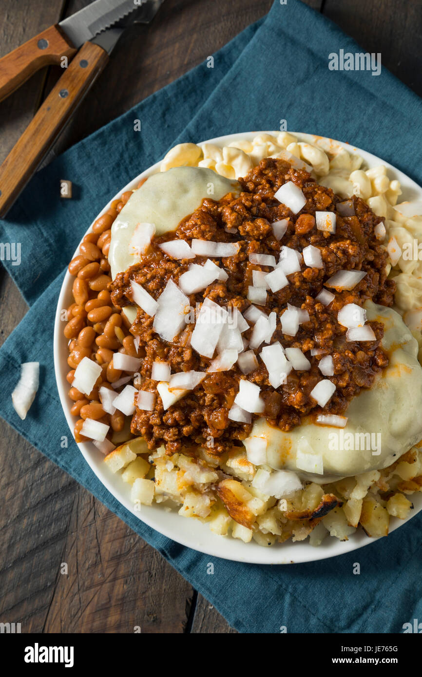 Unhealthy Homemade Beef Garbage Trash Plate with Potatoes Beans