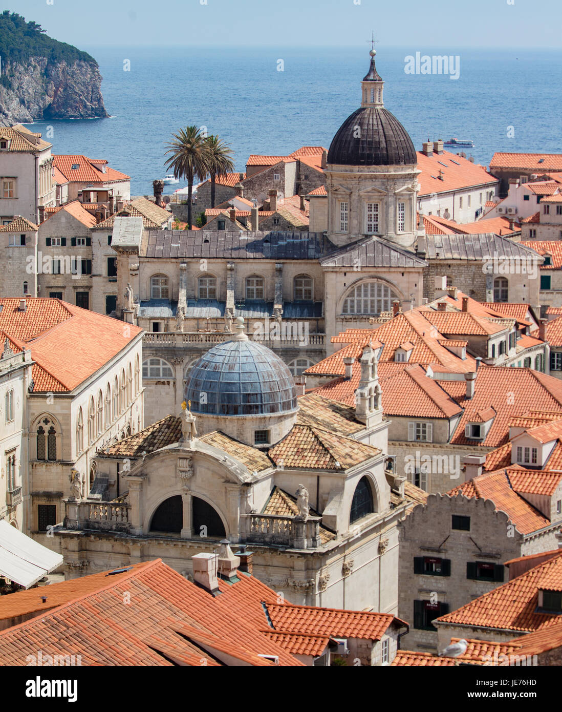 View from the massive defensive walls enclosing the beautiful red roofed medieval city of Dubrovnik on the Dalmation coast of Croatia Stock Photo