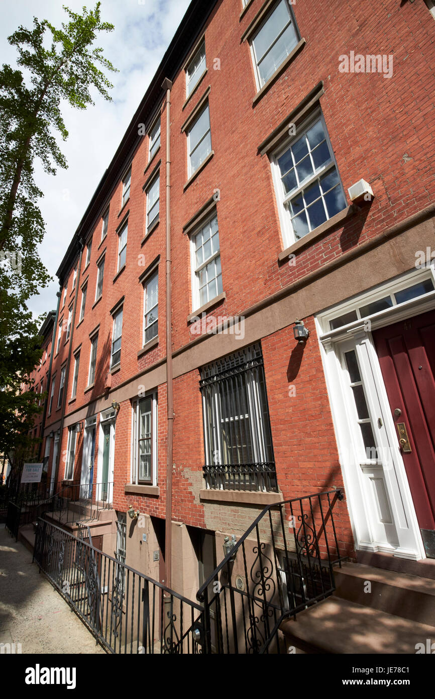 red brick townhouses with basement flats greenwich village New York City USA Stock Photo