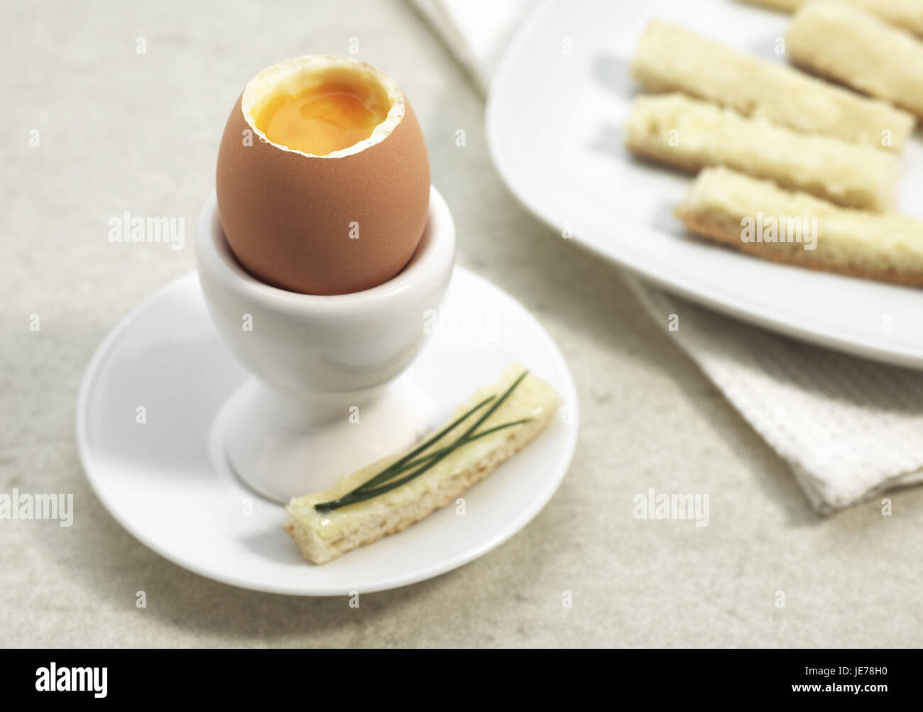boiled egg, eggcup, bread, Stock Photo