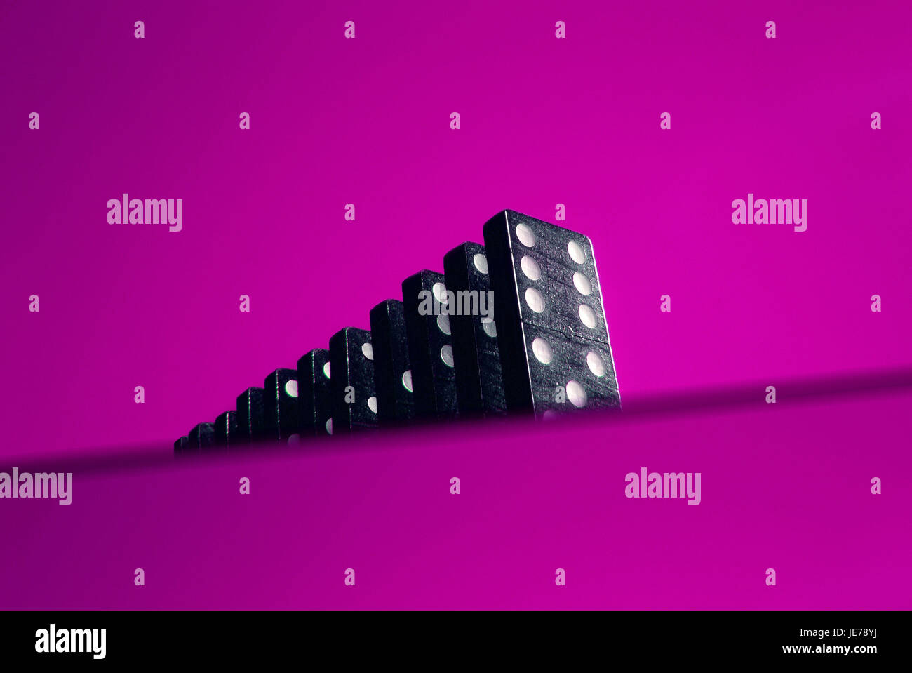 Dominos in a series Stock Photo Alamy