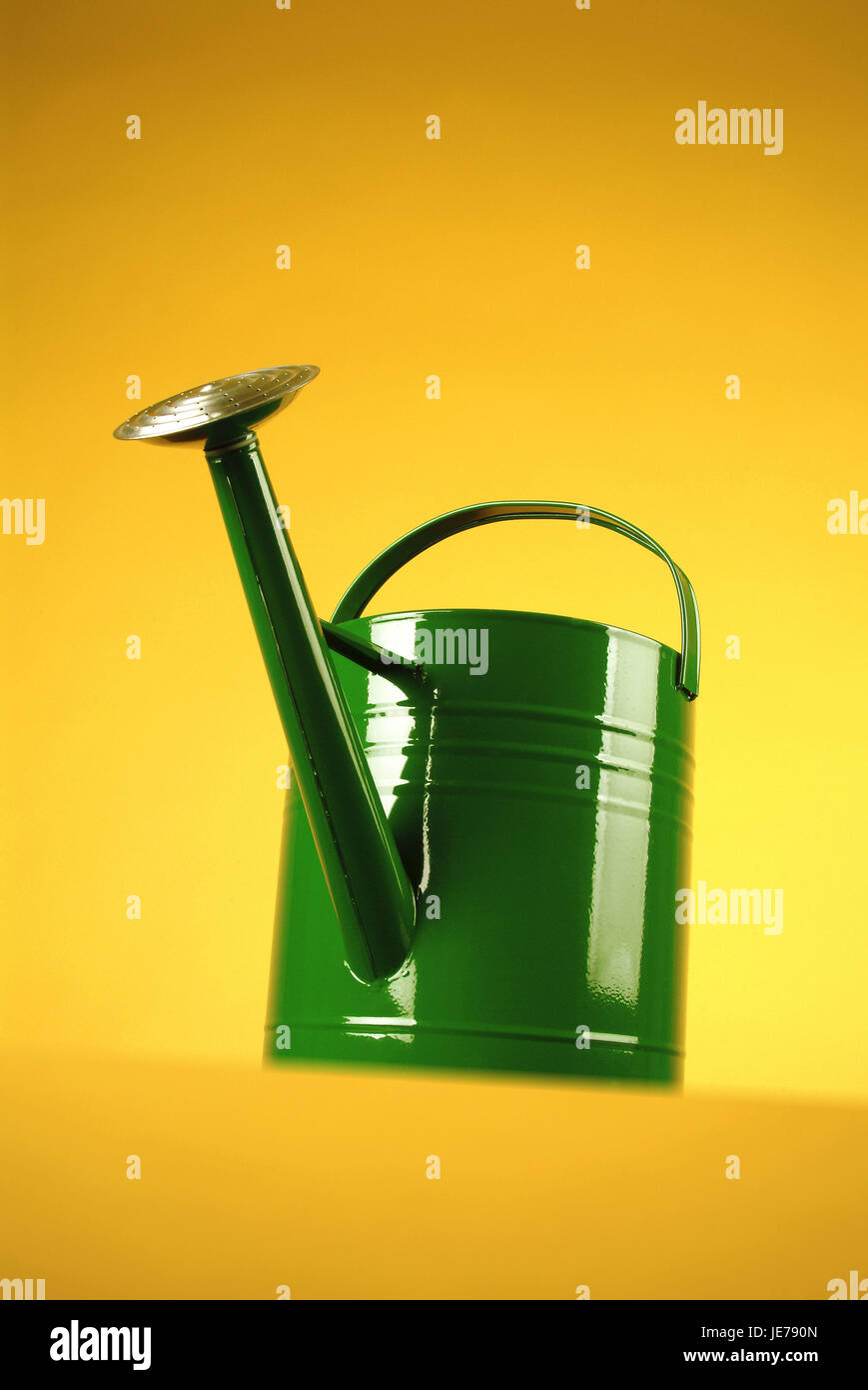 Green watering can from tin, Stock Photo