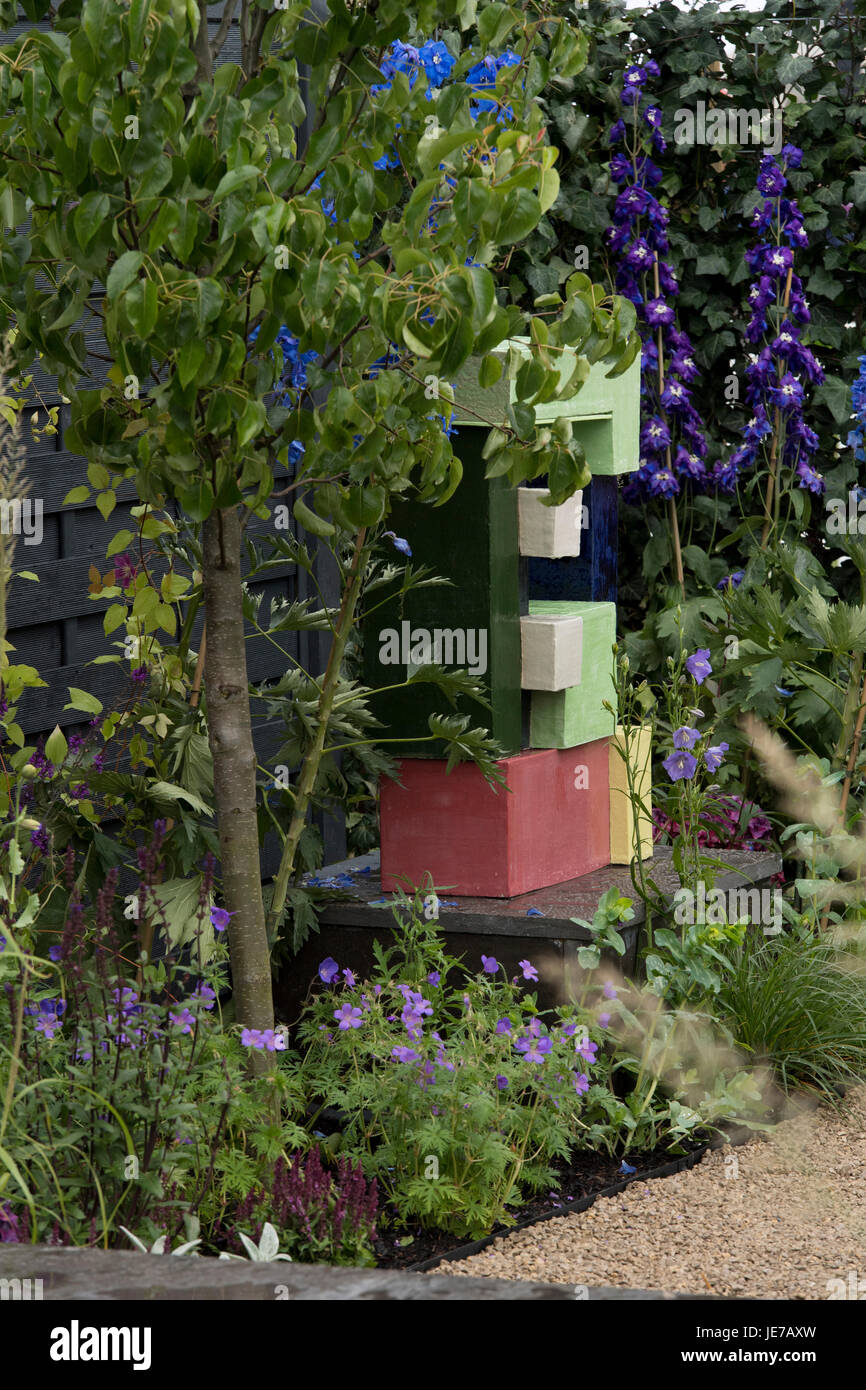 Colorful sculpture in Modernist & Bauhaus inspired Agriframes Garden - first RHS Chatsworth Flower Show -  Chatsworth House, Derbyshire, England, UK. Stock Photo