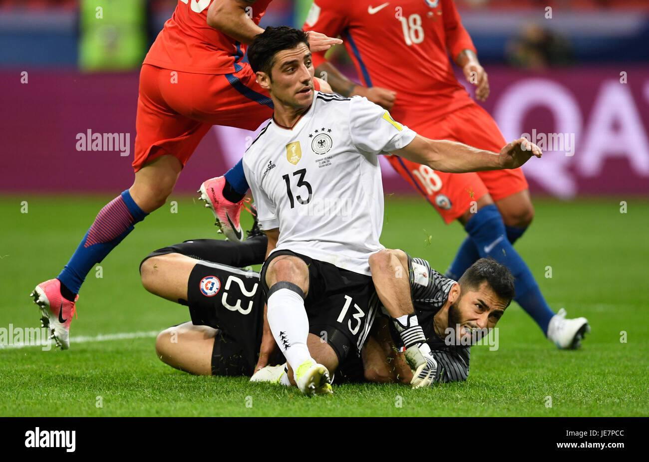 Kazan, Russia. 22nd June, 2017. Germany's Lars Stindl (C) defeats Chilean goalkeeper Johnny Herrera for the equalizer during the Group B preliminary stage soccer match between Chile and Germany at the Confederations Cup in Kazan, Russia, 22 June 2017. Photo: Marius Becker/dpa/Alamy Live News Stock Photo