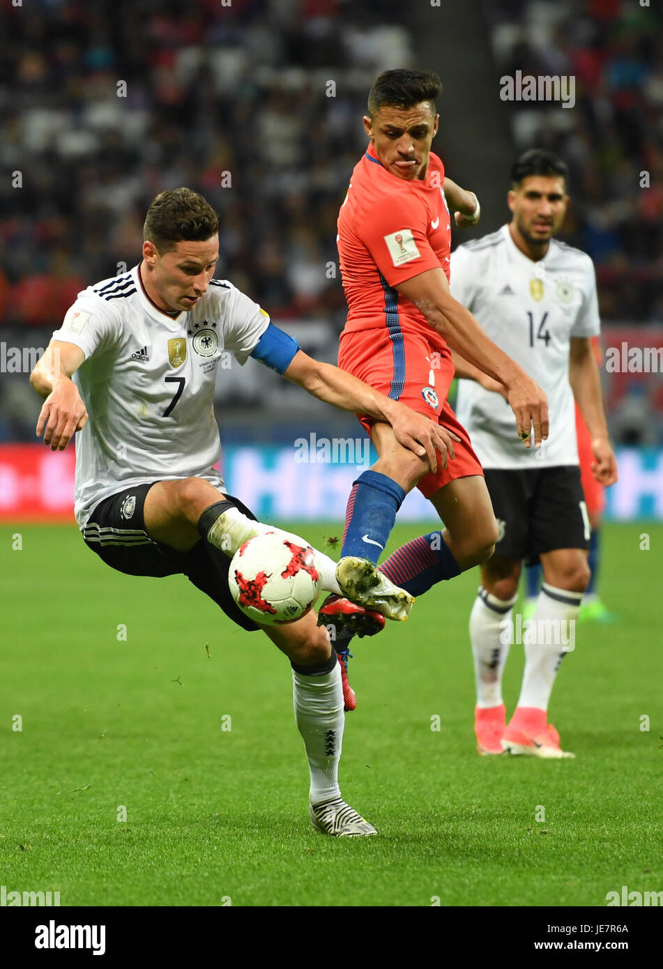 Kazan, Russia. 22nd June, 2017. Germany's Julian Draxler (L) and Chile's Alexis Sanchez vie for the ball during the Group B preliminary stage soccer match between Chile and Germany at the Confederations Cup in Kazan, Russia, 22 June 2017. Photo: Marius Becker/dpa/Alamy Live News Stock Photo