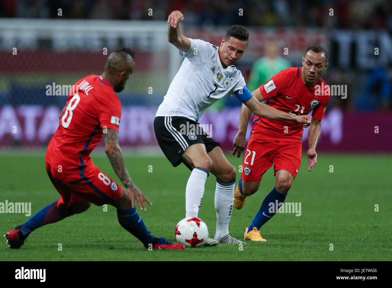 Kazan, Russia. 22nd June, 2017. Julian Draxler (C)of Germany vies with Arturo Vidal (L), Marcelo Diaz of Chile during group B match between Germany and Chile at the 2017 FIFA Confederations Cup in Kazan, Russia, on June 22, 2017. The match ended with a draw 1-1. Credit: Bai Xueqi/Xinhua/Alamy Live News Stock Photo
