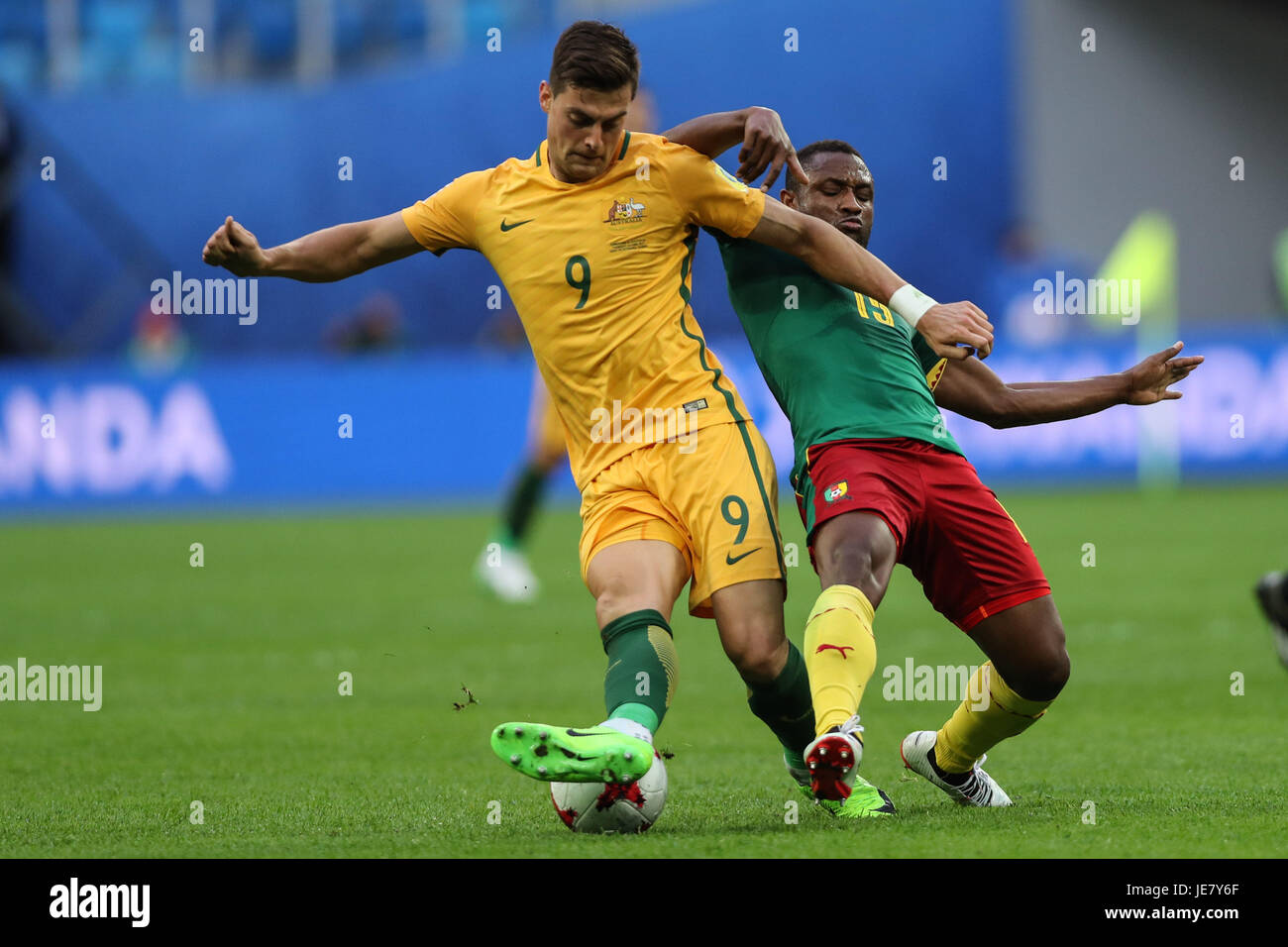 St. Petersburg, Russia. 22nd June, 2017. Sebastien Siani(R) of Cameroon vies with Tomi Juric of Australia during the group B match between Cameroon and Australia at the 2017 FIFA Confederations Cup in St. Petersburg, Russia, on June 22, 2017. The match ended with a 1-1 draw. Credit: Wu Zhuang/Xinhua/Alamy Live News Stock Photo