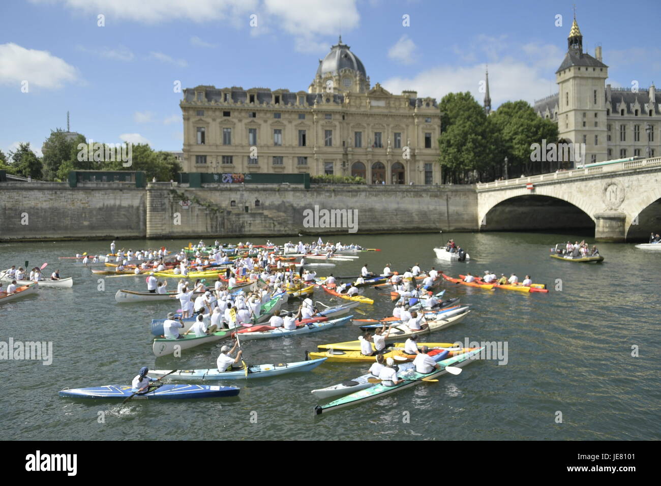 Julien Mattia / Le Pictorium -  Paris celebrates Olympism  -  23/06/2017  -  France / Paris  -  Canoeing on the Seine. A few weeks before the Olympic and Paralympic Games were awarded by the International Olympic Committee (IOC) in 2024, Paris is more than ever mobilized around its candidacy and organized two days where the heart of Paris transformed itself into an ephemeral Olympic park. Stock Photo