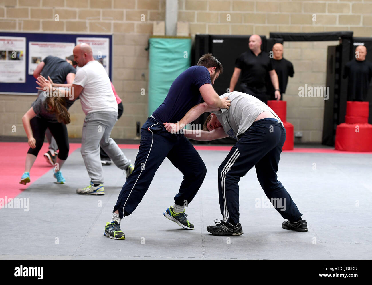 Police officers training in self defence. The focus of the event is to demonstrate the transparency around Dorset Police's use of force and the challenges involved, along with an overview of equipment and the skills that improve public and officer safety.  This comes ahead of the publication of use of force data by individual police forces nationally at the end of July. Officers during training Credit: Finnbarr Webster/Alamy Live News Stock Photo
