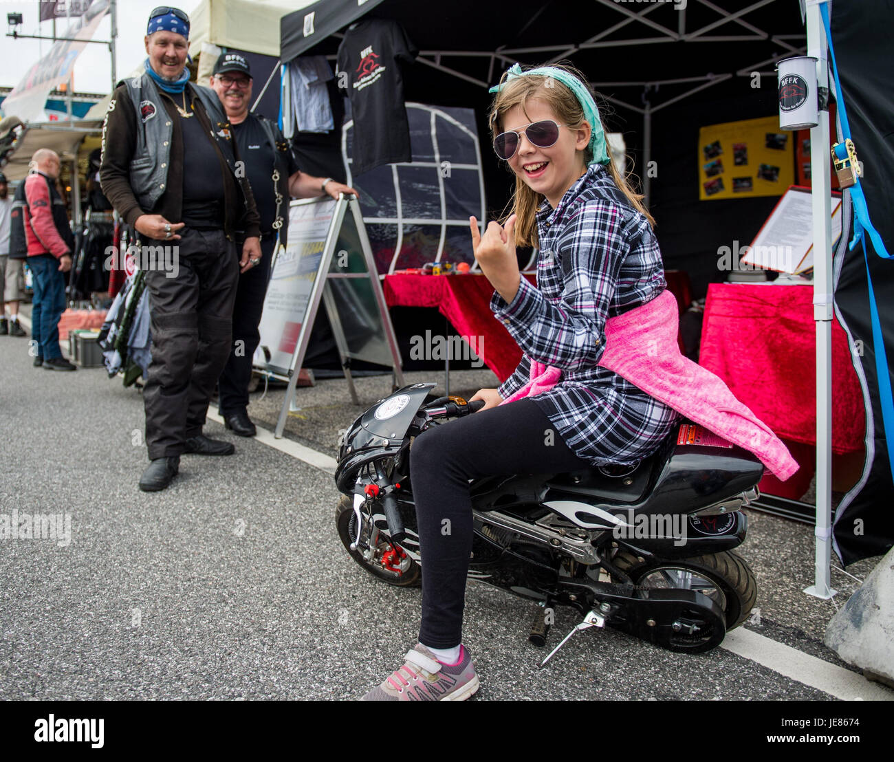Hamburg, Germany. 26th June, 2017. Visitors of the Harley Days arrive at the festival premises in Hamburg, Germany, 26 June 2017. The Harley Days will take place between the 23rd and the 25th of 2017. Photo: Axel Heimken/dpa/Alamy Live News Stock Photo