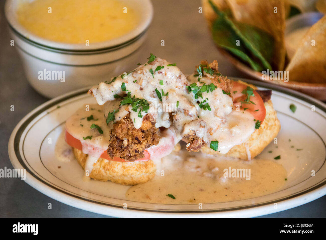 The Pearl, biscuit with fried chicken and sausage gravy, BeeHive Oven Biscuit Cafe, Brooklyn, NYC Stock Photo