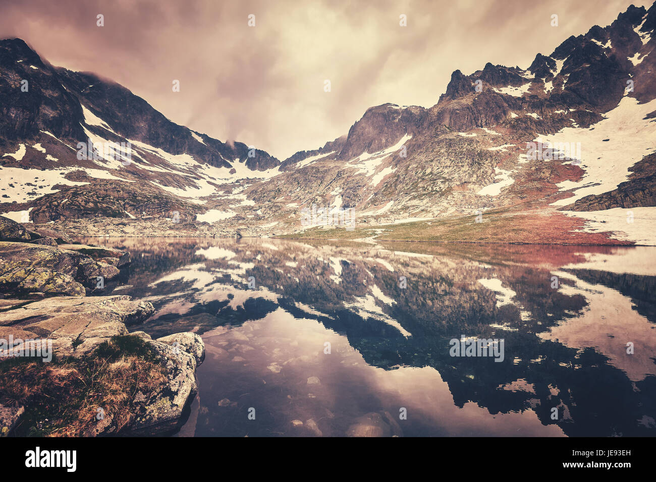 Color toned picture of a lake in High Tatra Mountains, Slovakia. Stock Photo