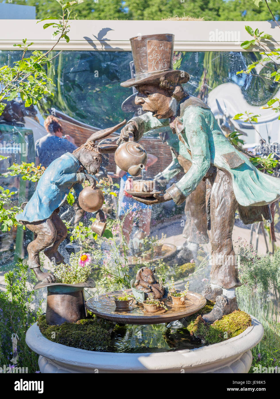 LONDON, UK - MAY 25, 2017: RHS Chelsea Flower Show 2017. Lewis Carroll's 'Alice in Wonderland' characters as sculptured garden figures. Stock Photo