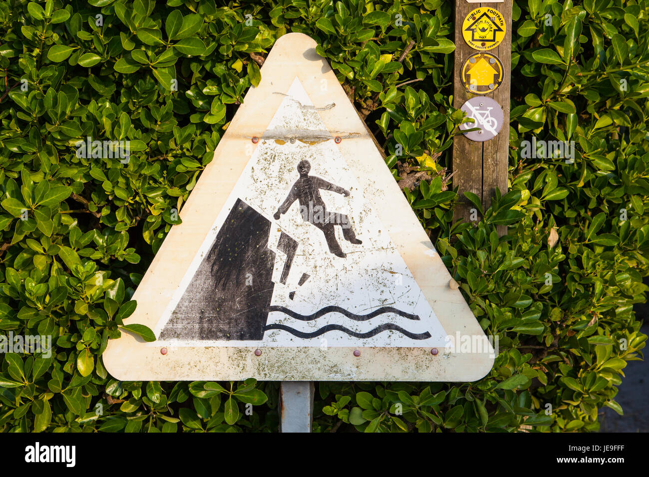 Danger - Unstable cliff edge warning sign Stock Photo