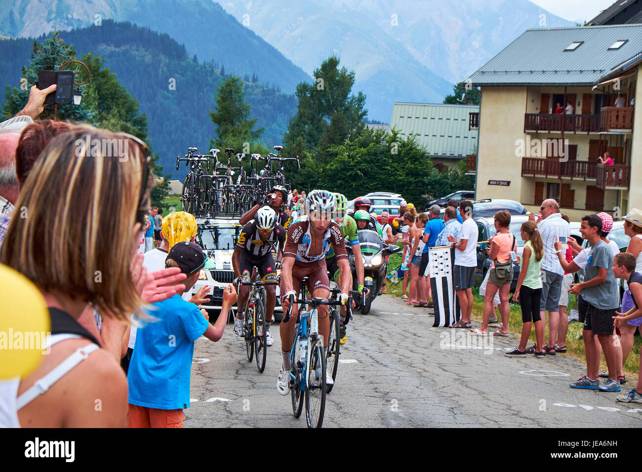 ALBIEZ-MONTROND, FRANCE - JULY 24, 2015: Mikael Cherel from team AG2R La Mondiale leading a group of bicycle riders to the mountain top Col du Mollard Stock Photo