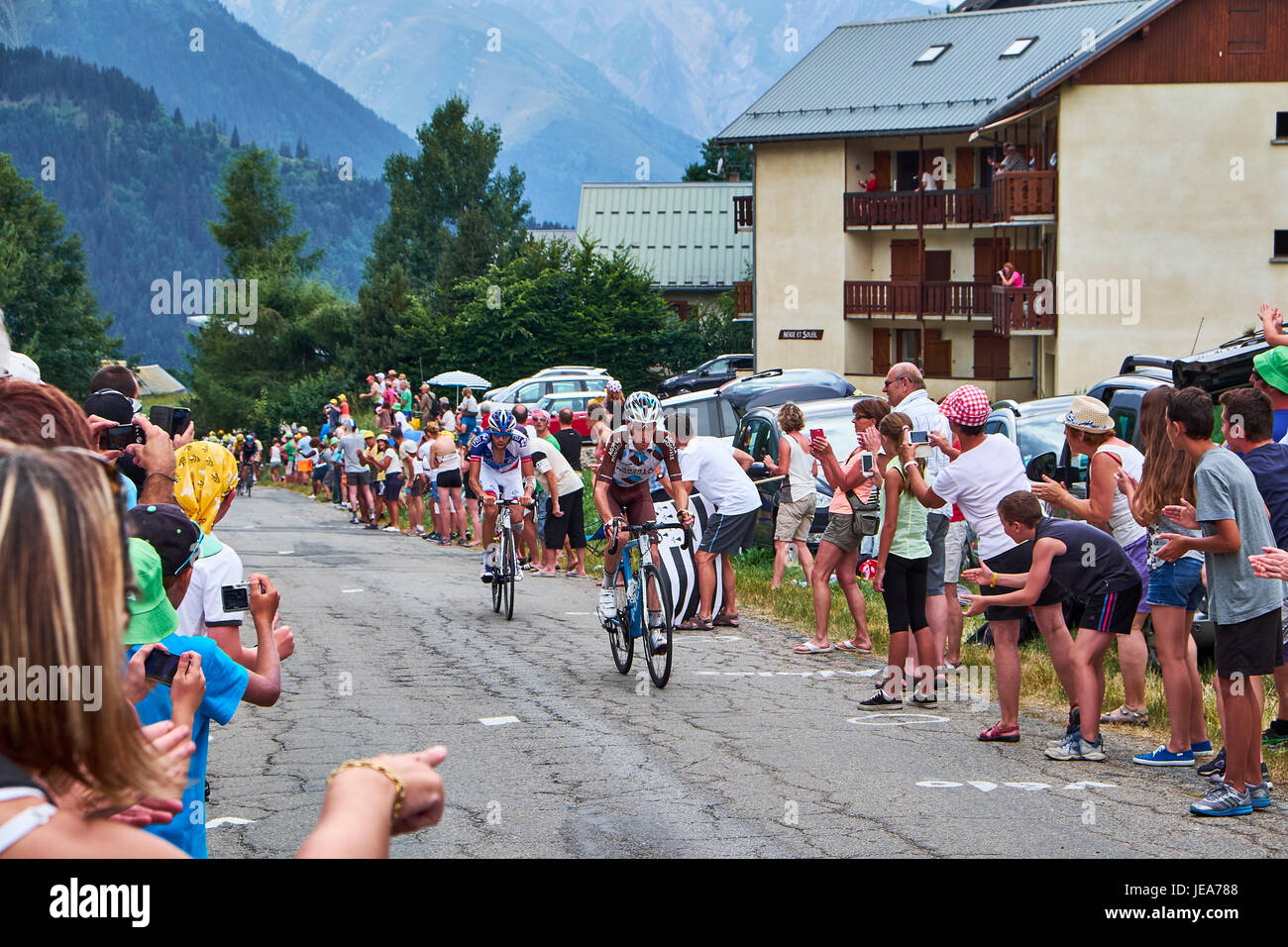 ALBIEZ-MONTROND, FRANCE - JULY 24, 2015: bicycle riders from AG2R La Mondiale and FDJ heading for the top on Col du Mollard in the village Albiez-Mont Stock Photo