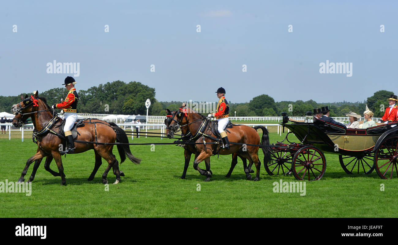 Members of the Royal Family ride in a coach at the start of a days ...