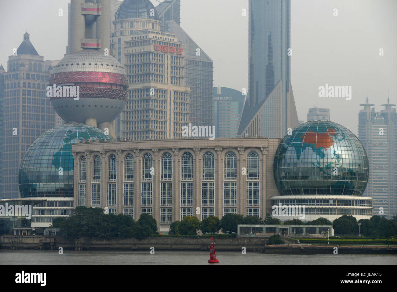 The Shanghai International Conference Center, located near the Oriental Pearl Tower, is a modern venue for international events and conferences. Known for its futuristic architecture, it is a significant landmark in the city, offering facilities for large-scale events and exhibitions. Stock Photo