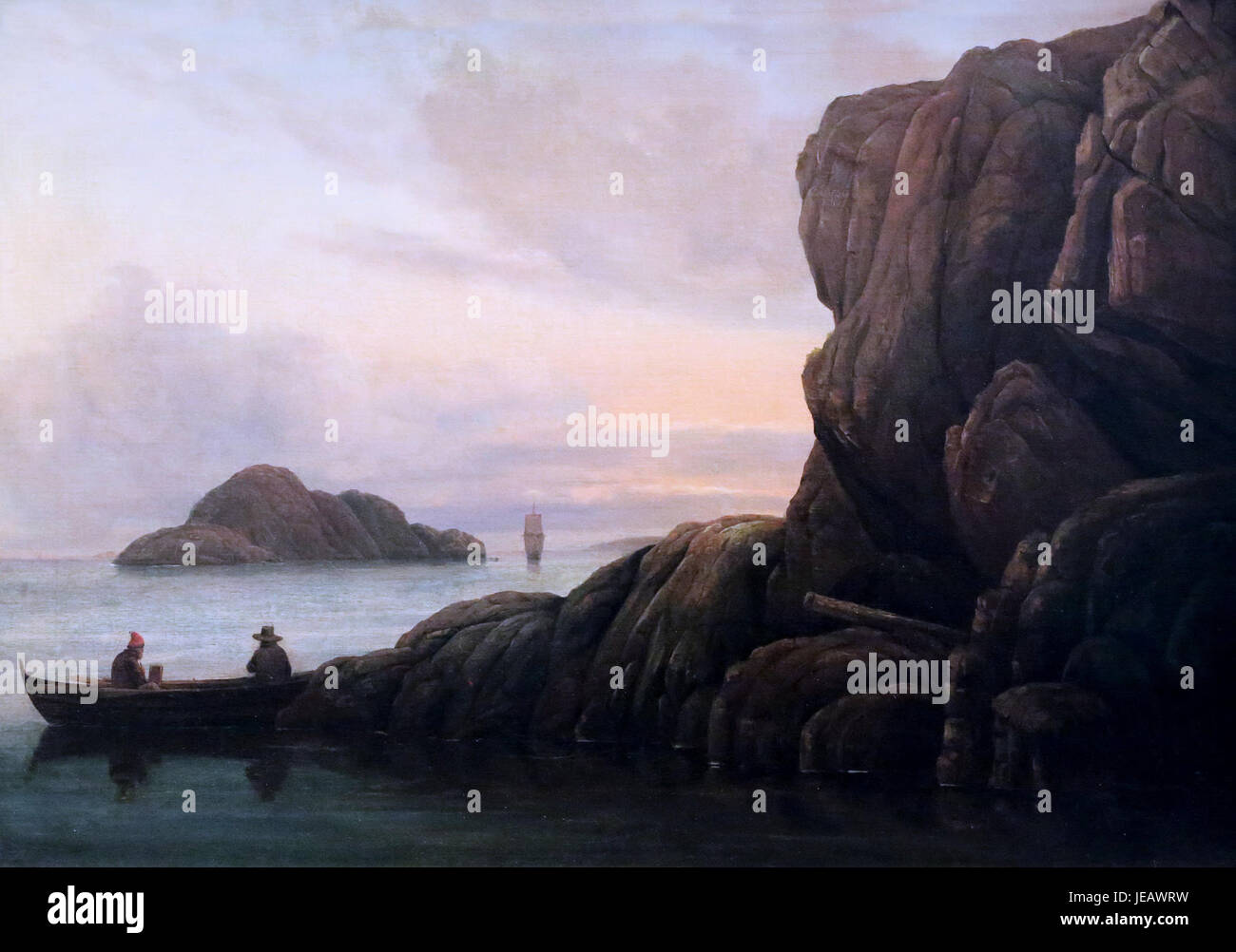 A painting by Carl Gustav Carus titled 'Abend am Meer' (Evening at the Sea), created between 1820-1825. The artwork depicts a serene coastal scene with a sunset over the water, reflecting the Romanticism movement’s emphasis on nature and emotional expression. Stock Photo