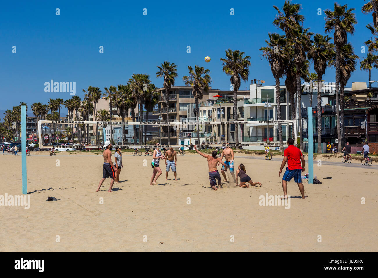 people, volleyball players, playing beach volleyball, beach volleyball game, beach volleyball, Venice Beach, Venice, Los Angeles, California Stock Photo