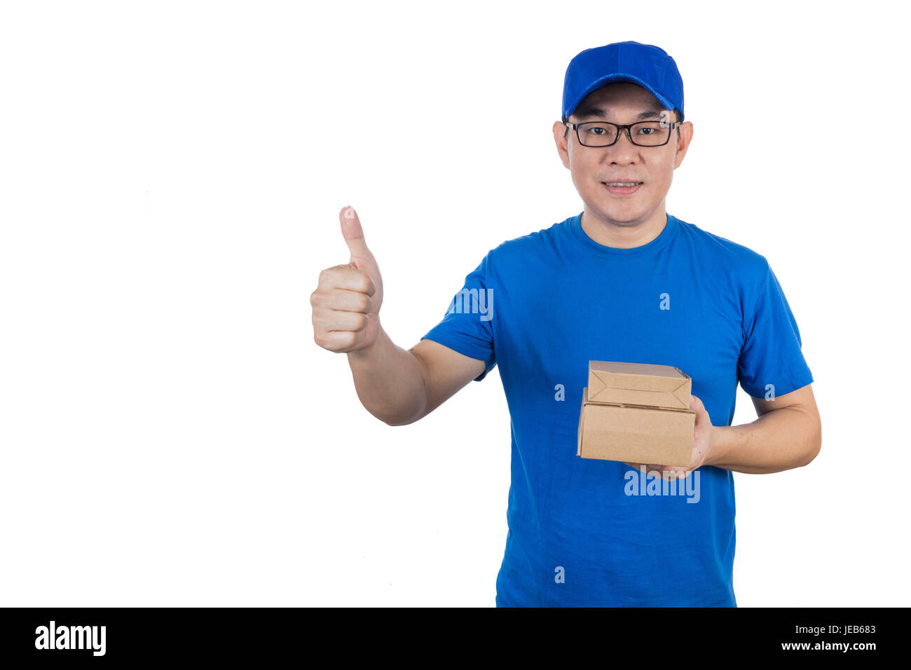Asian Chinese delivery guy in uniform showing thumbs up in isolated